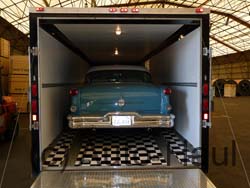 Oldsmobile in our enclosed trailer.