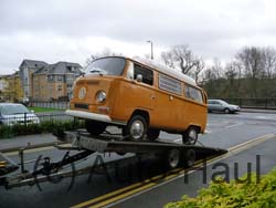 VW Camper, bay window being loaded in London